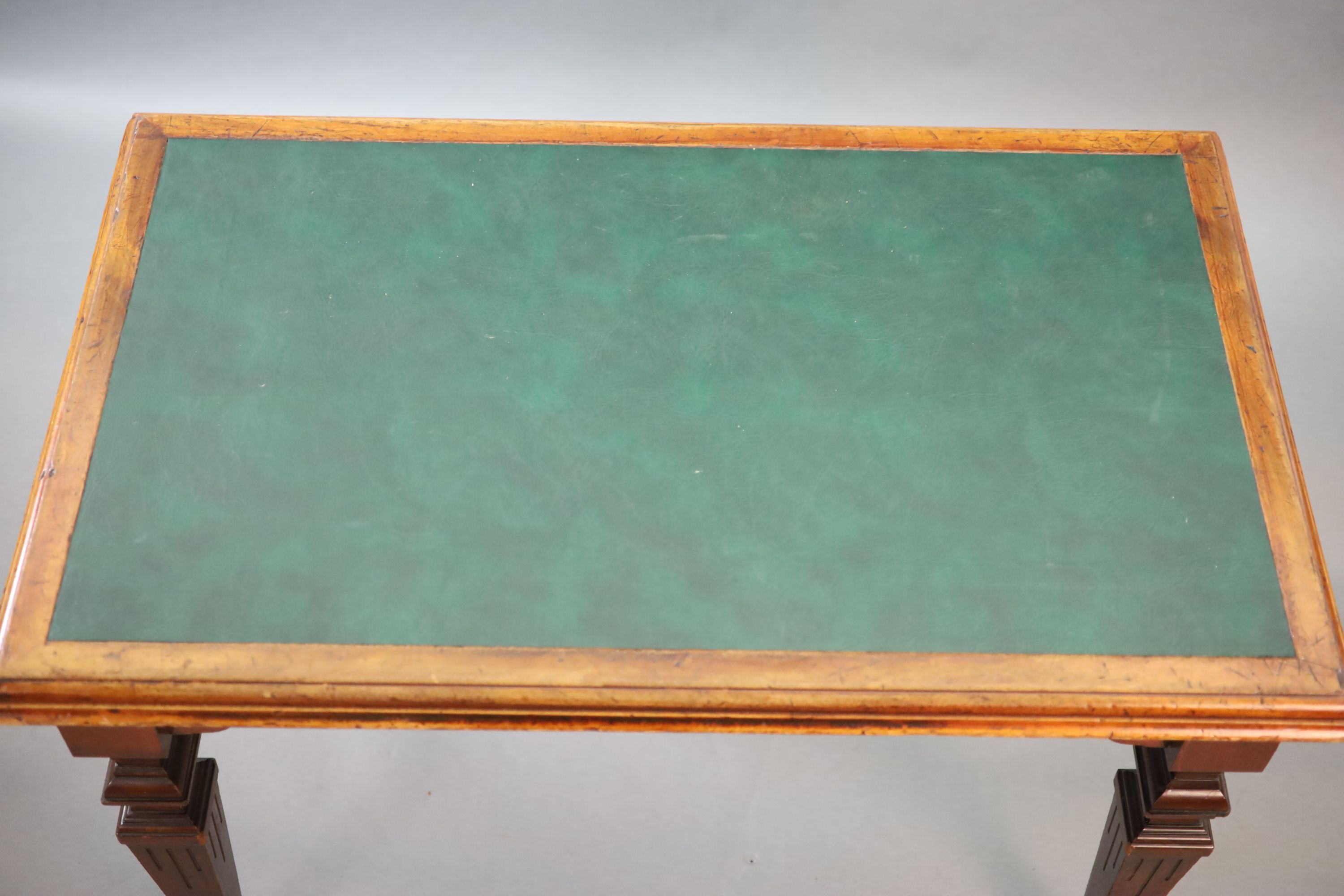 A late Victorian mahogany writing table, supplied by Sage & Co. Shopfitters of London, W.112cm D.68cm H.79cm